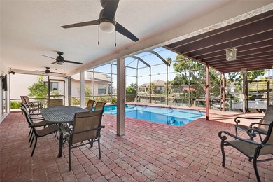 mAJOR RICE REDUCTION! Welcome to your luxury waterfront oasis in on Royal Tee Country Club in Florida - for sale on GolfHomes.com, golf home, golf lot