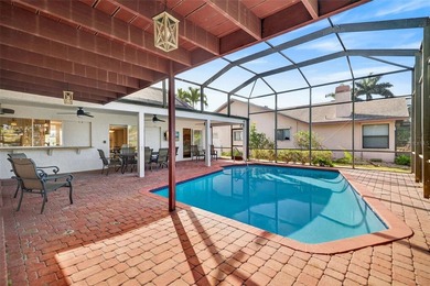 mAJOR RICE REDUCTION! Welcome to your luxury waterfront oasis in on Royal Tee Country Club in Florida - for sale on GolfHomes.com, golf home, golf lot