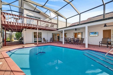 mAJOR RICE REDUCTION! Welcome to your luxury waterfront oasis in on Royal Tee Country Club in Florida - for sale on GolfHomes.com, golf home, golf lot