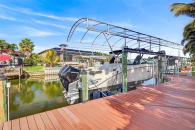 mAJOR RICE REDUCTION! Welcome to your luxury waterfront oasis in on Royal Tee Country Club in Florida - for sale on GolfHomes.com, golf home, golf lot