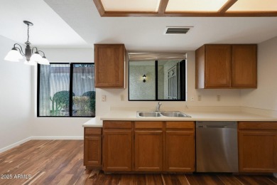 BEAUTIFUL ACAIA WOOD FLOORS greet you upon entering this 2 on Fountain of the Sun Country Club in Arizona - for sale on GolfHomes.com, golf home, golf lot