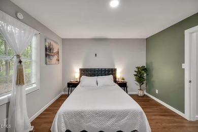 Beautifully updated 4-bedroom, 2-bath home in the highly on Twin Lakes Golf Course in North Carolina - for sale on GolfHomes.com, golf home, golf lot