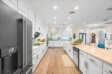 Welcome to 2110 Harbor Ct, a custom waterfront retreat located on Rockport Country Club in Texas - for sale on GolfHomes.com, golf home, golf lot