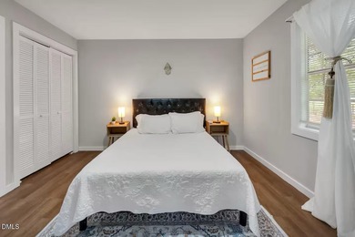 Beautifully updated 4-bedroom, 2-bath home in the highly on Twin Lakes Golf Course in North Carolina - for sale on GolfHomes.com, golf home, golf lot