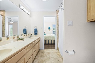 Welcome to 2110 Harbor Ct, a custom waterfront retreat located on Rockport Country Club in Texas - for sale on GolfHomes.com, golf home, golf lot