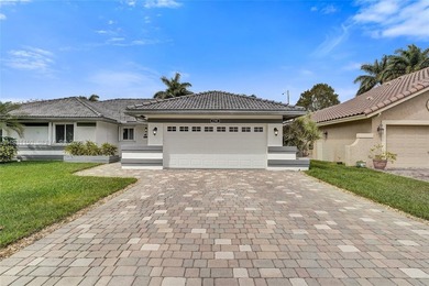 SHOWINGS BEGIN AT OPEN HOUSE ON SATURDAY, MARCH 14 FROM 12-3 PM! on Pine Island Ridge Country Club in Florida - for sale on GolfHomes.com, golf home, golf lot