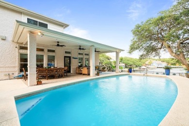 Welcome to 2110 Harbor Ct, a custom waterfront retreat located on Rockport Country Club in Texas - for sale on GolfHomes.com, golf home, golf lot