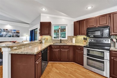 SHOWINGS BEGIN AT OPEN HOUSE ON SATURDAY, MARCH 14 FROM 12-3 PM! on Pine Island Ridge Country Club in Florida - for sale on GolfHomes.com, golf home, golf lot