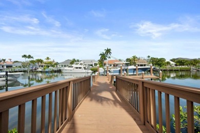 Welcome to this exquisite Mediterranean waterfront estate in the on The Club At Admirals Cove Golf Village in Florida - for sale on GolfHomes.com, golf home, golf lot