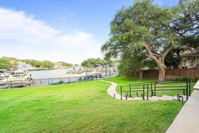 Welcome to 2110 Harbor Ct, a custom waterfront retreat located on Rockport Country Club in Texas - for sale on GolfHomes.com, golf home, golf lot