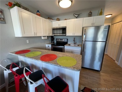 Welcome to your perfect Lake of the Ozarks getaway! This on Sycamore Creek Golf Club in Missouri - for sale on GolfHomes.com, golf home, golf lot