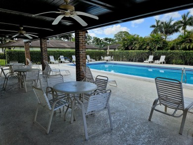Welcome to Greentree Villas 55+ community--South Florida living on Pine Tree Golf Club in Florida - for sale on GolfHomes.com, golf home, golf lot