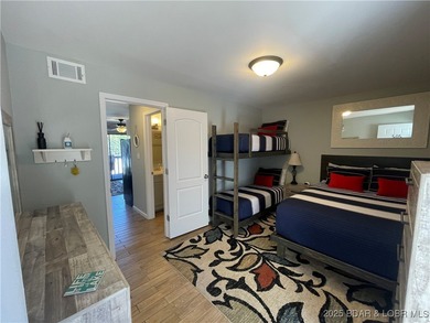 Welcome to your perfect Lake of the Ozarks getaway! This on Sycamore Creek Golf Club in Missouri - for sale on GolfHomes.com, golf home, golf lot