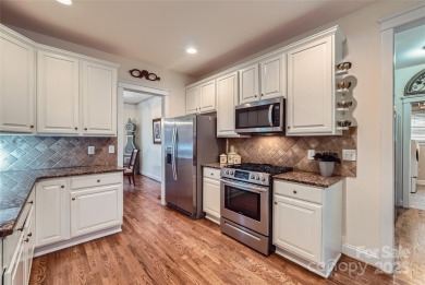 Welcome to 10614 Waycross Dr in Huntersville--a spacious carpet on Skybrook Golf Club in North Carolina - for sale on GolfHomes.com, golf home, golf lot