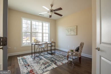 Discover relaxed, resort-style living in this charming on Lanier Island Legacy Golf Couorse in Georgia - for sale on GolfHomes.com, golf home, golf lot