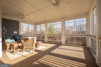 Discover relaxed, resort-style living in this charming on Lanier Island Legacy Golf Couorse in Georgia - for sale on GolfHomes.com, golf home, golf lot