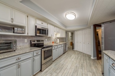 Welcome to this beautifully appointed and generously updated on Tarpon Woods Golf Club in Florida - for sale on GolfHomes.com, golf home, golf lot