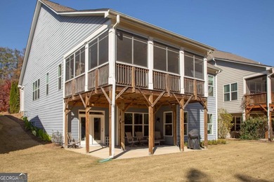 Discover relaxed, resort-style living in this charming on Lanier Island Legacy Golf Couorse in Georgia - for sale on GolfHomes.com, golf home, golf lot