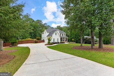 Exceptional 6-Bedroom, 5-Bath Luxury Home with Resort-Style on Whitewater Creek in Georgia - for sale on GolfHomes.com, golf home, golf lot