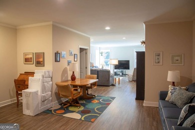 Discover relaxed, resort-style living in this charming on Lanier Island Legacy Golf Couorse in Georgia - for sale on GolfHomes.com, golf home, golf lot