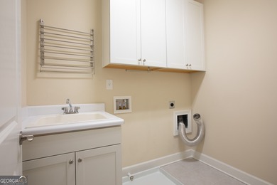 Discover relaxed, resort-style living in this charming on Lanier Island Legacy Golf Couorse in Georgia - for sale on GolfHomes.com, golf home, golf lot