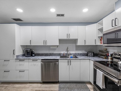 SEEING IS BELIEVING! This beautifully renovated 55+ condominium on Summertree Golf Course in Florida - for sale on GolfHomes.com, golf home, golf lot