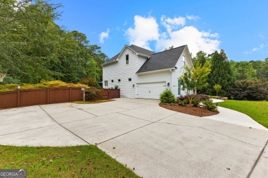 Exceptional 6-Bedroom, 5-Bath Luxury Home with Resort-Style on Whitewater Creek in Georgia - for sale on GolfHomes.com, golf home, golf lot