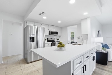 Welcome to this beautifully updated 2-bedroom, 2-bathroom on Highland Lakes Executive Golf Course in Florida - for sale on GolfHomes.com, golf home, golf lot