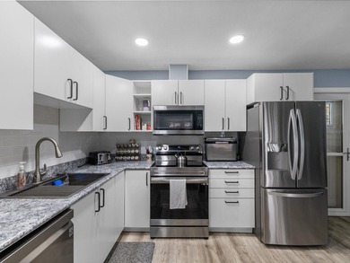 SEEING IS BELIEVING! This beautifully renovated 55+ condominium on Summertree Golf Course in Florida - for sale on GolfHomes.com, golf home, golf lot