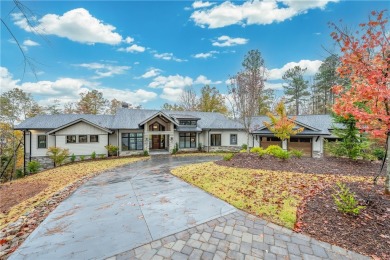 This newly constructed waterfront retreat, located in The on The Cliffs At Keowee Springs in South Carolina - for sale on GolfHomes.com, golf home, golf lot