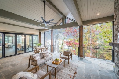 This newly constructed waterfront retreat, located in The on The Cliffs At Keowee Springs in South Carolina - for sale on GolfHomes.com, golf home, golf lot