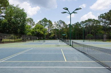 Welcome to resort-style living in this stunning fully renovated on Hunters Green Country Club in Florida - for sale on GolfHomes.com, golf home, golf lot