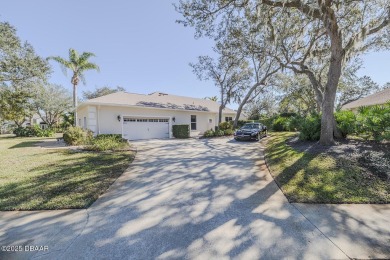 Lushly landscaped Halifax Plantation pool home meticulously on Halifax Plantation Golf Club in Florida - for sale on GolfHomes.com, golf home, golf lot