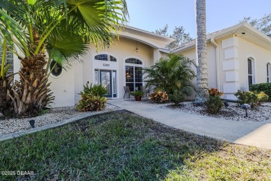 Lushly landscaped Halifax Plantation pool home meticulously on Halifax Plantation Golf Club in Florida - for sale on GolfHomes.com, golf home, golf lot