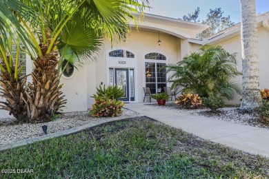 Lushly landscaped Halifax Plantation pool home meticulously on Halifax Plantation Golf Club in Florida - for sale on GolfHomes.com, golf home, golf lot