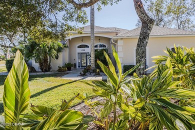 Lushly landscaped Halifax Plantation pool home meticulously on Halifax Plantation Golf Club in Florida - for sale on GolfHomes.com, golf home, golf lot