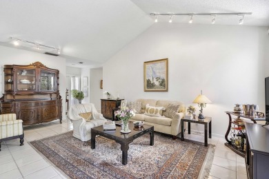 This beautiful condominium in Boca West is just steps away from on Boca West Golf and Country Club in Florida - for sale on GolfHomes.com, golf home, golf lot
