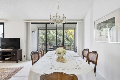 This beautiful condominium in Boca West is just steps away from on Boca West Golf and Country Club in Florida - for sale on GolfHomes.com, golf home, golf lot