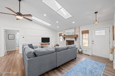 Feel instantly at home as you step into this bright, open on Harbour Point Golf Club in North Carolina - for sale on GolfHomes.com, golf home, golf lot