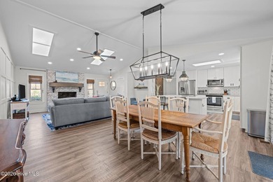 Feel instantly at home as you step into this bright, open on Harbour Point Golf Club in North Carolina - for sale on GolfHomes.com, golf home, golf lot