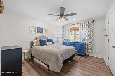 Feel instantly at home as you step into this bright, open on Harbour Point Golf Club in North Carolina - for sale on GolfHomes.com, golf home, golf lot