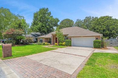 Welcome Home to this amazing all-brick Bluewater Bay home on Fairway Oaks at Magnolia Golf Course in Florida - for sale on GolfHomes.com, golf home, golf lot