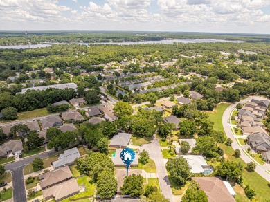Welcome Home to this amazing all-brick Bluewater Bay home on Fairway Oaks at Magnolia Golf Course in Florida - for sale on GolfHomes.com, golf home, golf lot
