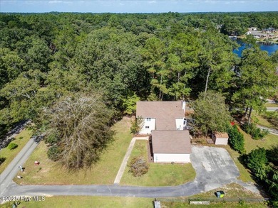 Motivated sellers offering $5,000 buyer incentive! Welcome to on River Bend Golf and Country Club in North Carolina - for sale on GolfHomes.com, golf home, golf lot