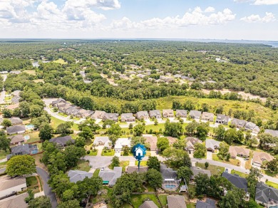 Welcome Home to this amazing all-brick Bluewater Bay home on Fairway Oaks at Magnolia Golf Course in Florida - for sale on GolfHomes.com, golf home, golf lot