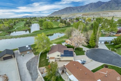 ON THE GOLF COURSE!  Check out the photos.  This is an on Stansbury Park Golf Club in Utah - for sale on GolfHomes.com, golf home, golf lot