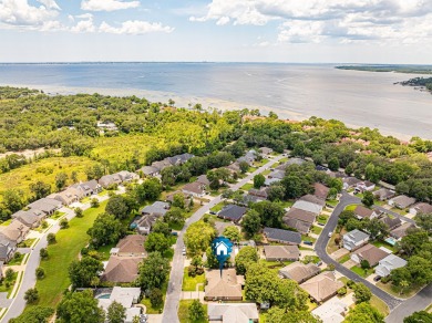 Welcome Home to this amazing all-brick Bluewater Bay home on Fairway Oaks at Magnolia Golf Course in Florida - for sale on GolfHomes.com, golf home, golf lot