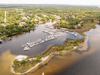 Welcome Home to this amazing all-brick Bluewater Bay home on Fairway Oaks at Magnolia Golf Course in Florida - for sale on GolfHomes.com, golf home, golf lot