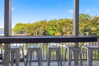 This beautifully updated 2-bedroom, 2-bath lakefront condo on Tan-Tar-A Golf Club in Missouri - for sale on GolfHomes.com, golf home, golf lot
