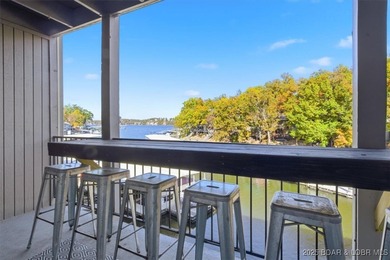 This beautifully updated 2-bedroom, 2-bath lakefront condo on Tan-Tar-A Golf Club in Missouri - for sale on GolfHomes.com, golf home, golf lot